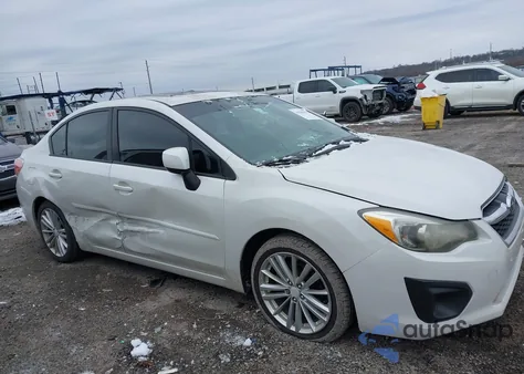 2014 Subaru Impreza 2.0I Premium z USA, uszkodzony, nr VIN JF1GJAD67EH021619